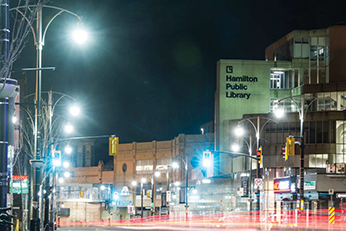 Photo of street scene with Hamilton Public Library