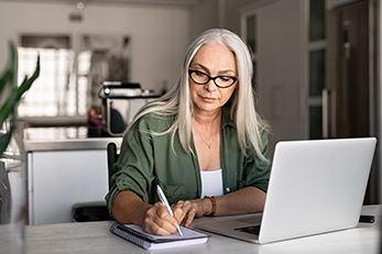 Woman working from home on laptop