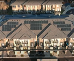 row of townhouses with solar panels